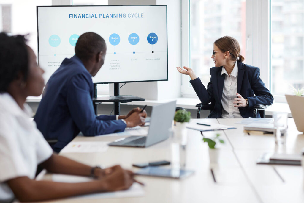 K&W Marketing Consultants | Female Leader using Wheelchair in Meeting