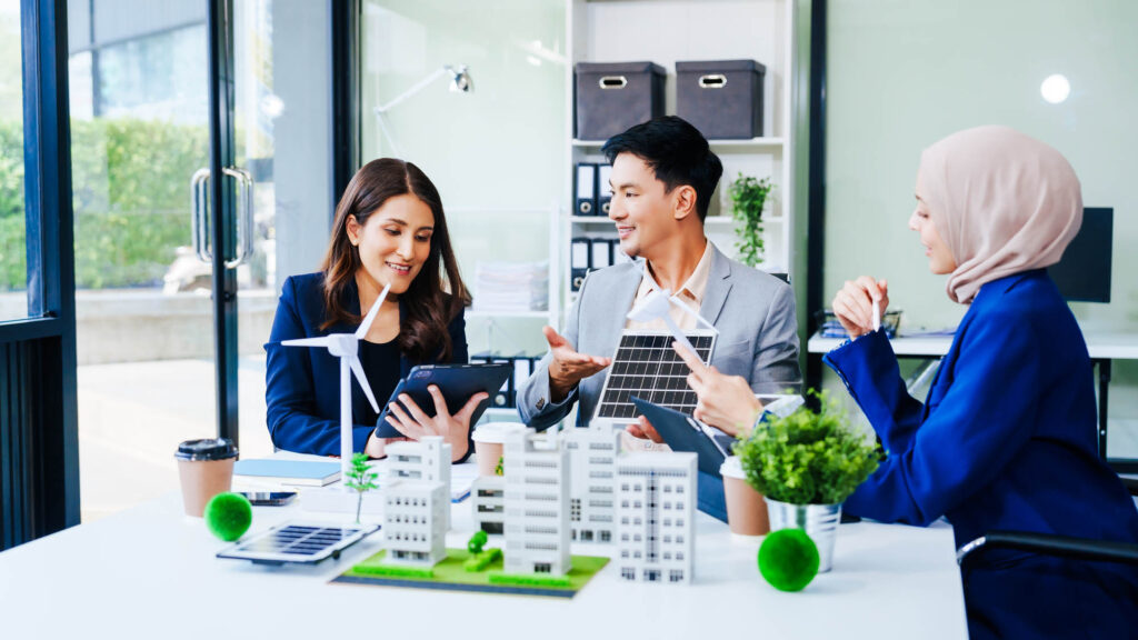 K&W Marketing Consultants | Trio of businesspeople, including a middle-aged Asian man and wo